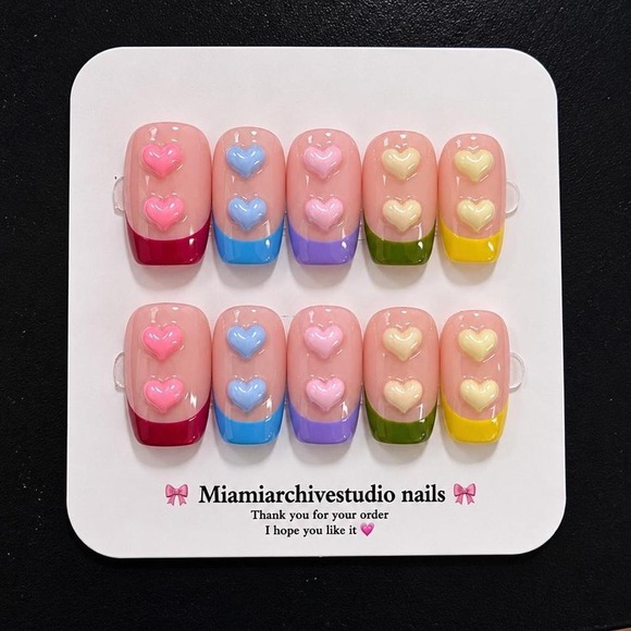 Nails Inc. Other - Pastel heart press on nails featuring glossy pink nude base with colorful french